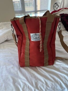 Poler orange Canvas Messenger Tote with Brown Trim